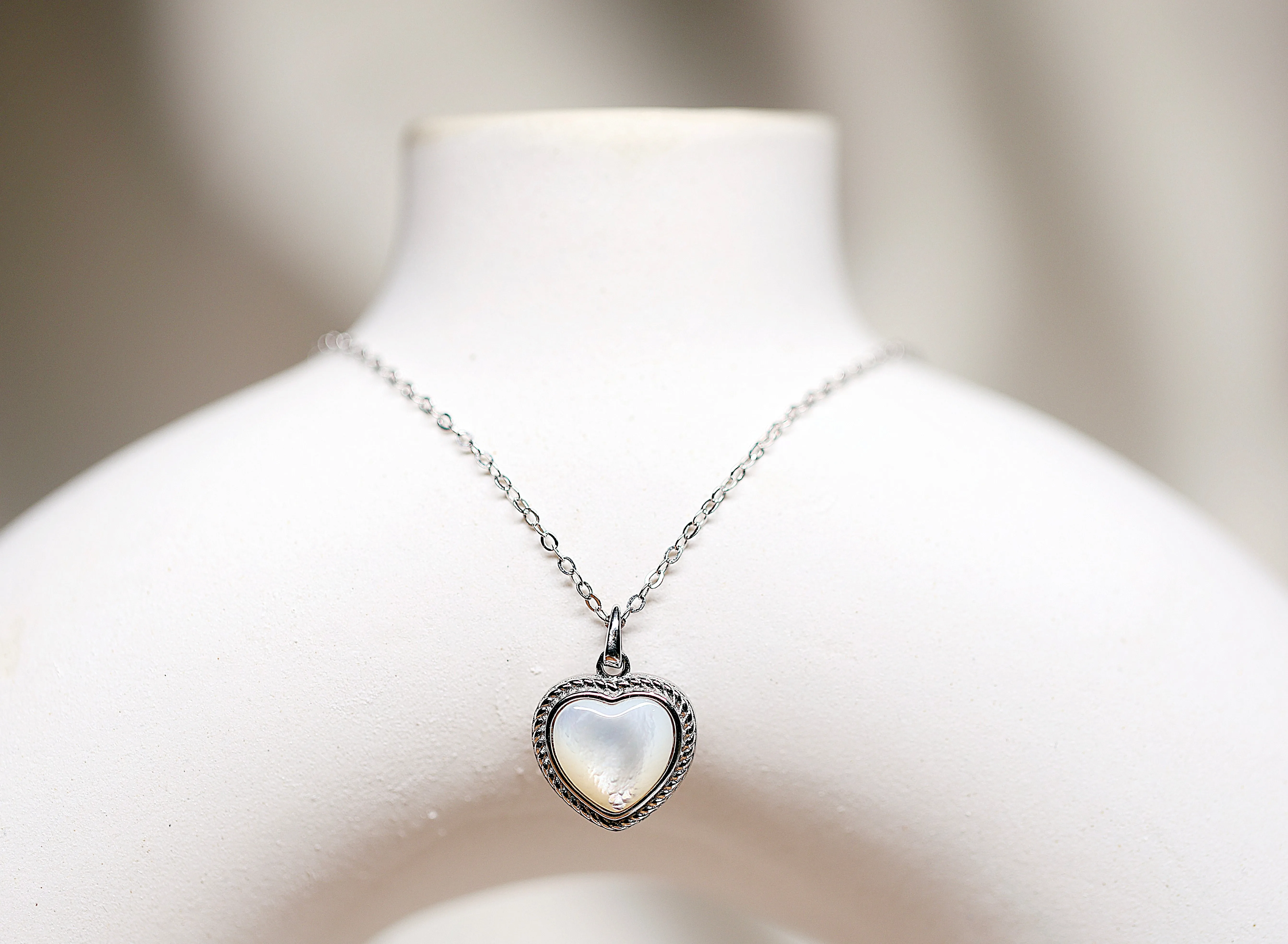 Silver heart pendant necklace