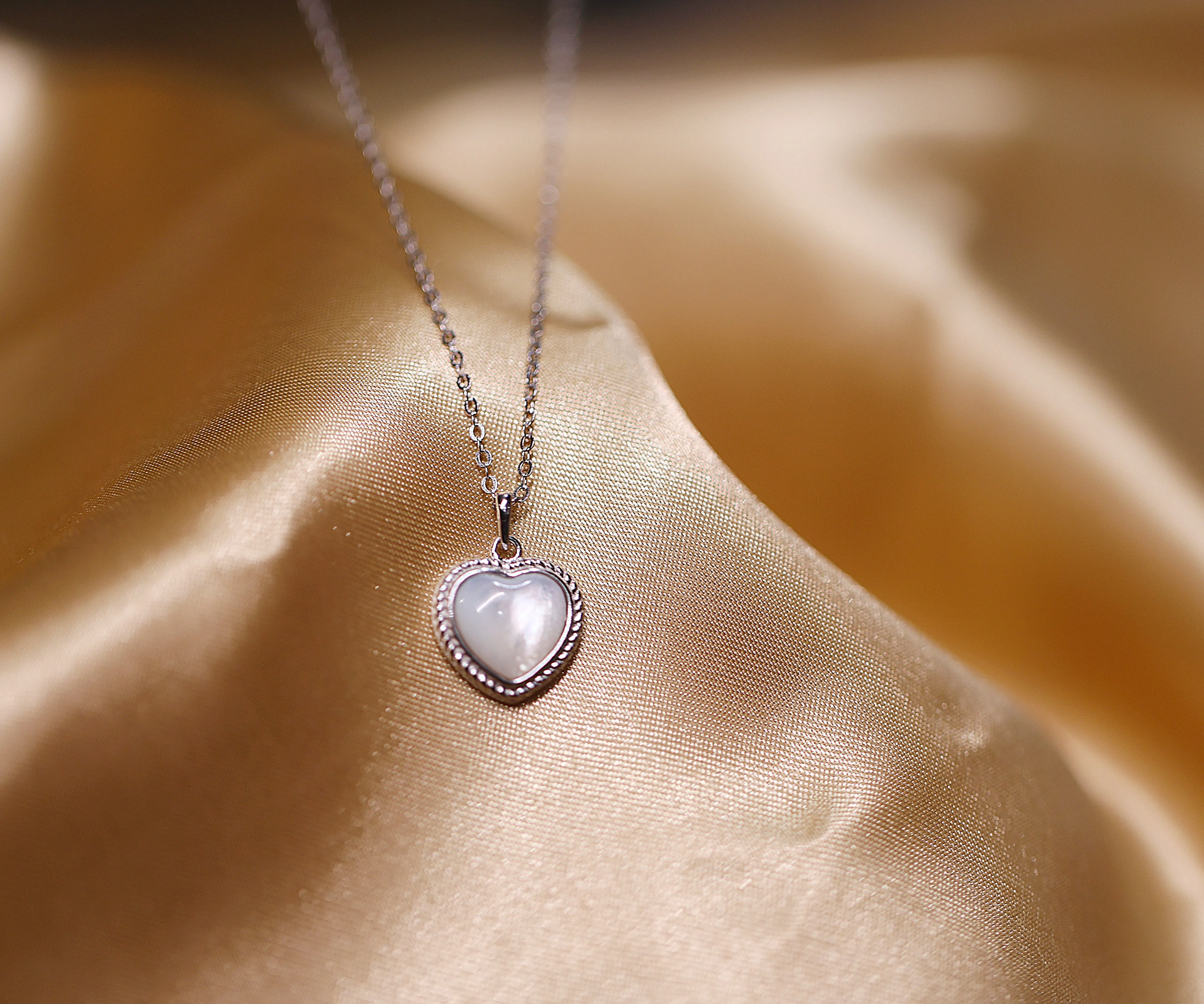 Silver heart pendant necklace