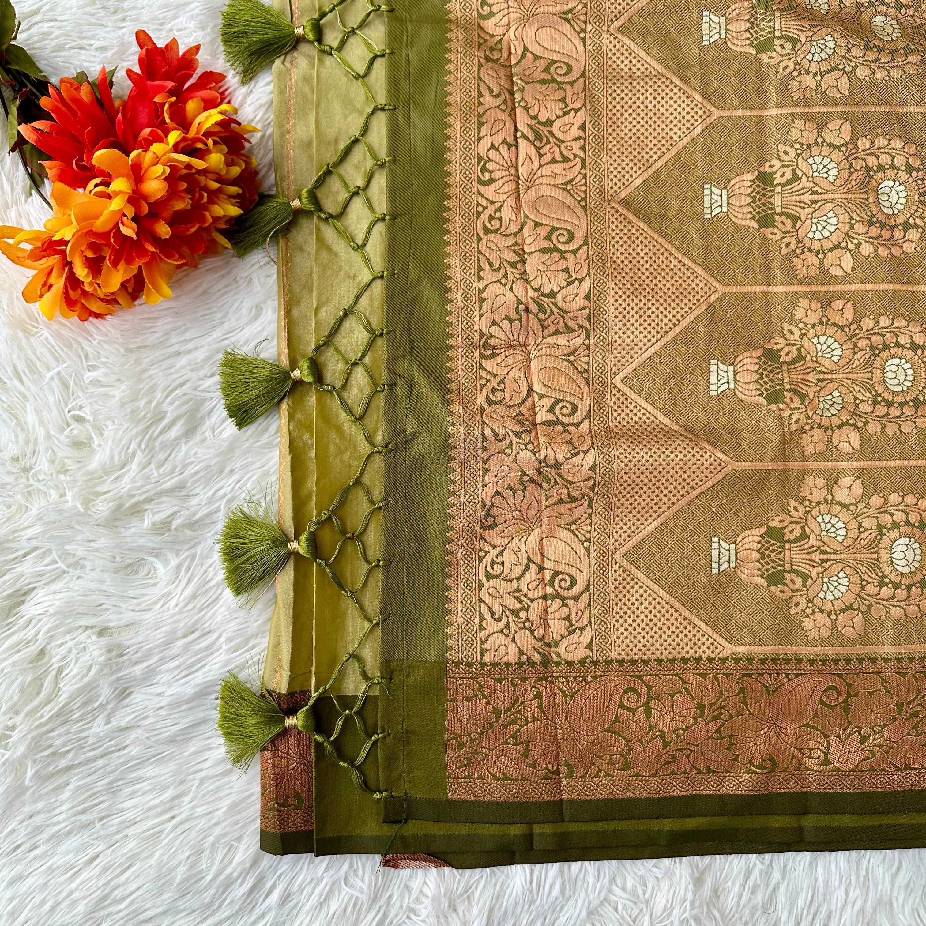 The Natural Beauty Olive Green Color Saree With The Rich Copper Zari border